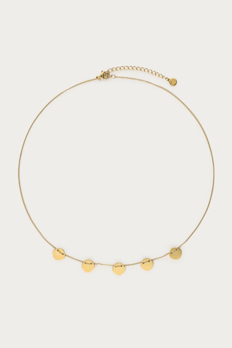 Minimalistische ketting met vijf munten